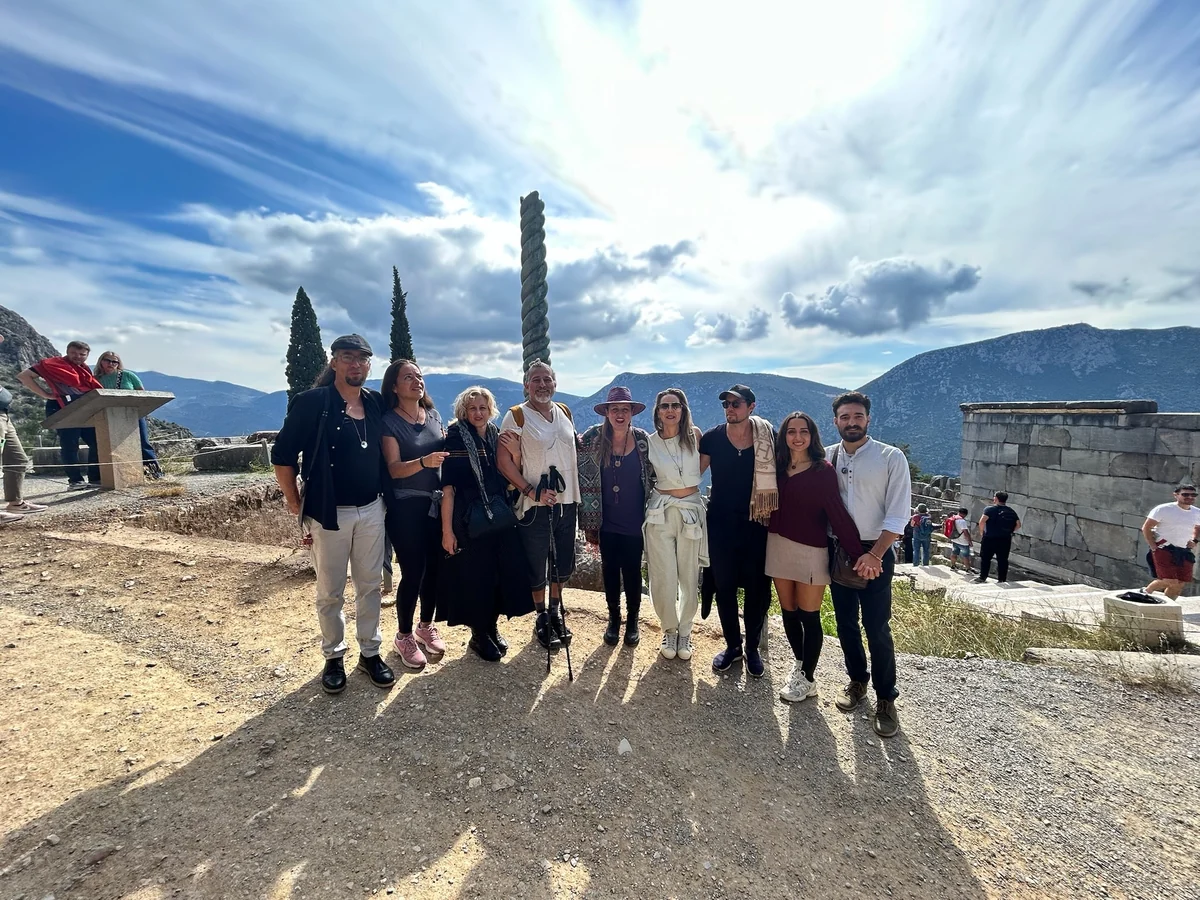 Loukia Papa with the circle beside the Serpent Column in the Sanctuary of Apollo, Delphi