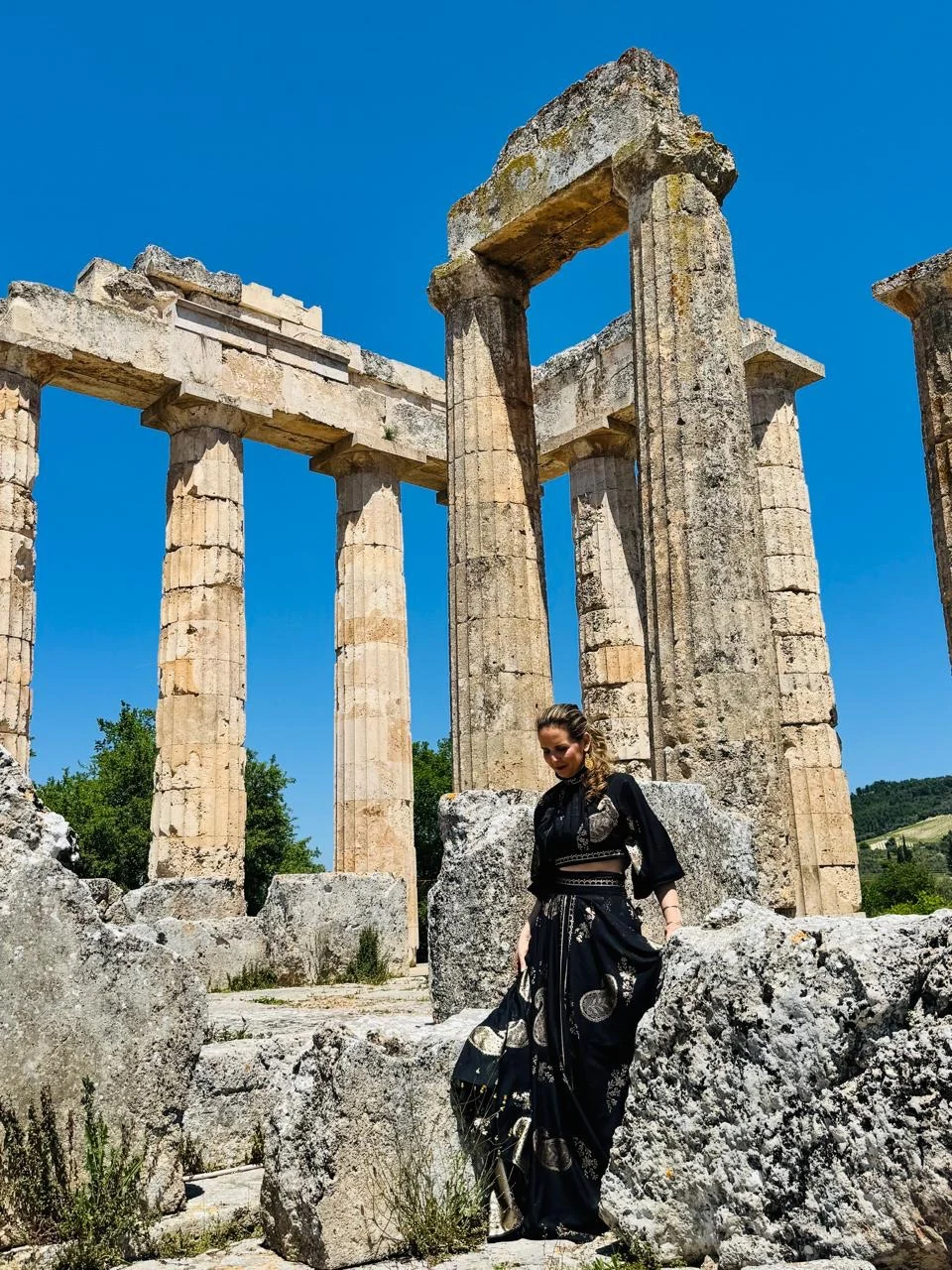 Loukia Papa among the columns of the Temple of Zeus at Nemea