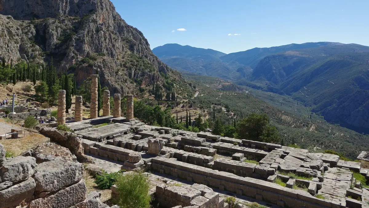 The Temple of Apollo at Delphi, with the valley and the mountains beyond
