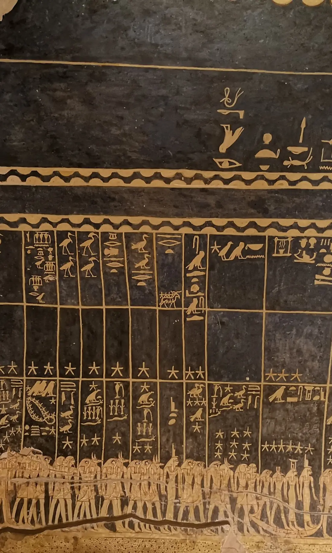 The astronomical ceiling of the tomb of Seti I, stars and hieroglyphs in gold on black